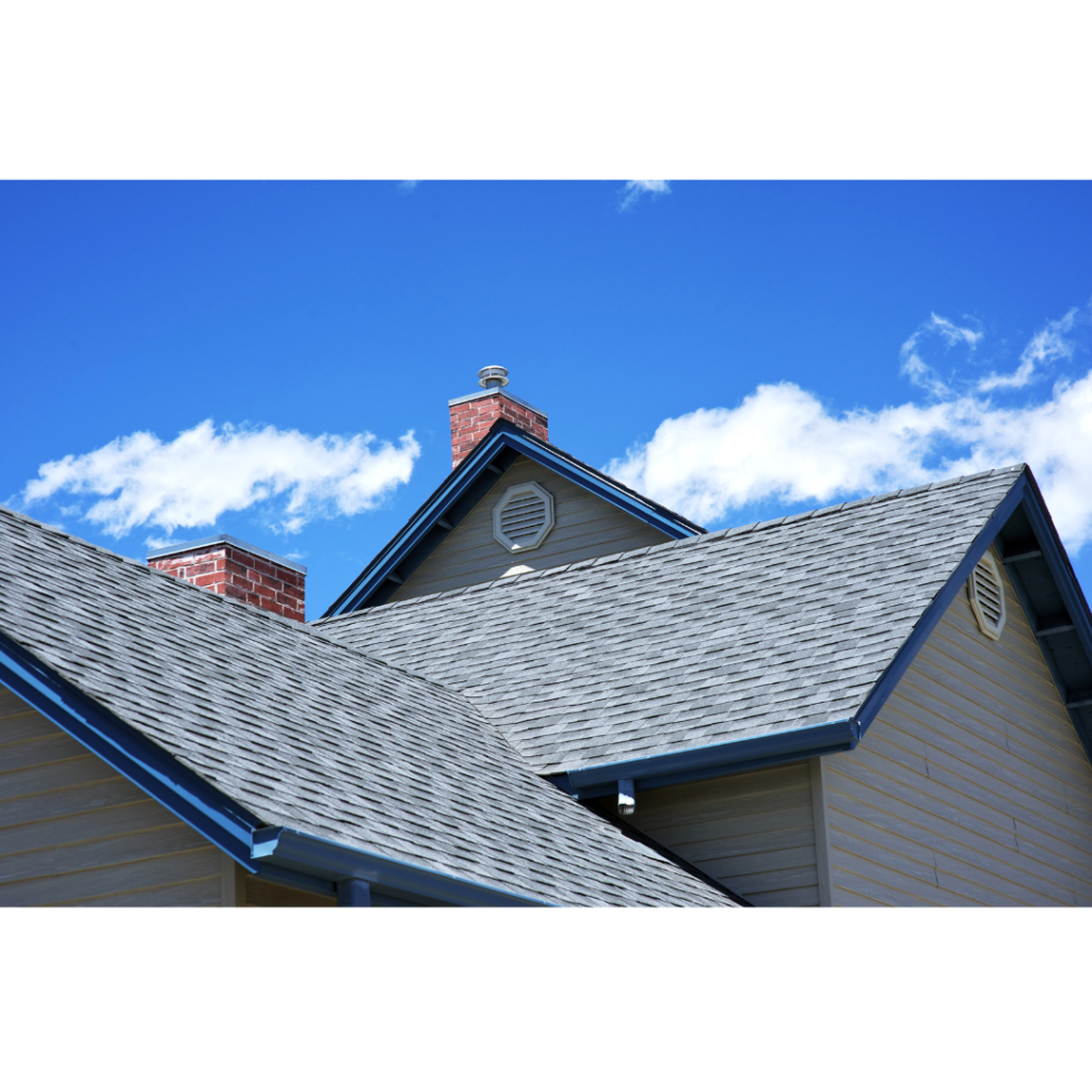 Exterior shot of multi level roofing on a residential home.