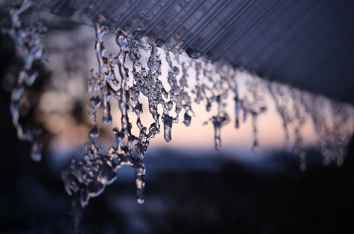 Icicles hang from a roof